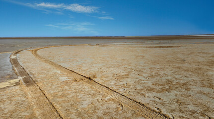 Scenic Desert Landscape with cloudy Blue Sky on the road to Lake Eyre