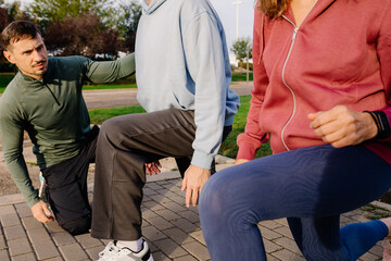 Specialist in seniors supervises functional workout of older couple