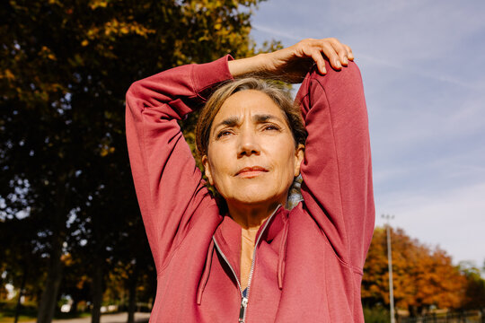 Elderly woman taking a break following a functional exercise routine