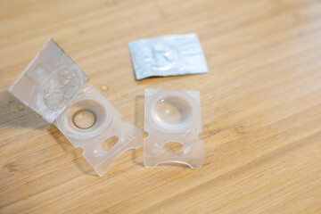 Opened Contact Lens on Table with Copy Space