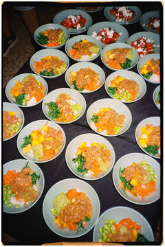 Plates arranged on a catering table during a private event
