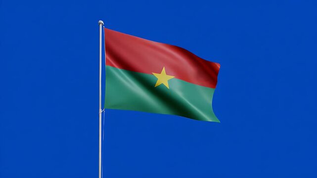 Burkina Faso flag waving proudly against a blue screen background&nbsp;in a patriotic display of national pride and identity, symbol of nationhood