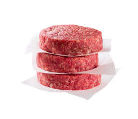 Raw burger beef patties isolated on a white background.
