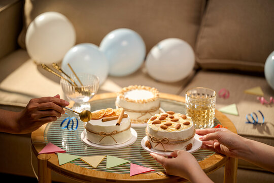 Delicious mini cakes with decorations on a table
