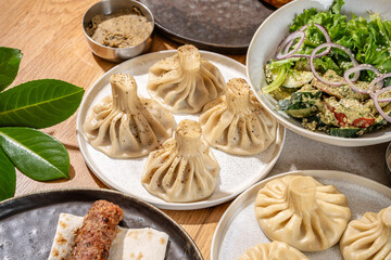 Traditional Georgian Khinkali With Fresh Salad