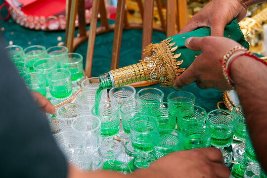 Pouring Mint Liqueur at a Traditional Gypsy Wedding