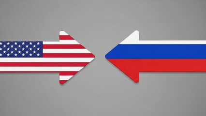 Fototapeta premium The flags of the United States and Russia pointing in opposite directions on a gray background, symbolizing international relations and diplomacy.