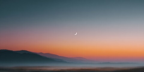 Moon is shining in the sky above a mountain range
