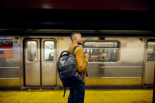 Man waits for the subway train