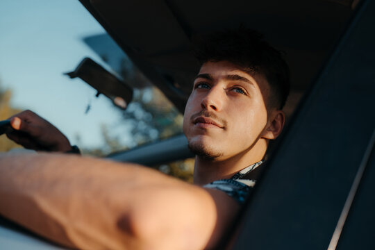 Young man inside a car portrait