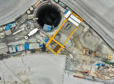 Aerial View of Urban Construction Site Around a Tunnel Shaft