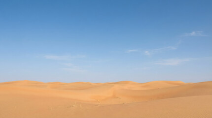 Minimal desert landscape featuring smooth sand dunes under a clear sky, representing simplicity, isolation, and natural beauty.