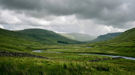 Natural green valley with rolling hills beneath a cloudy sky, offering a peaceful countryside landscape with cinematic mood and wide open space.