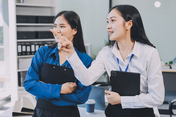 Businesswomen having discussion in office