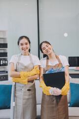 Cleaners clean empty office spaces