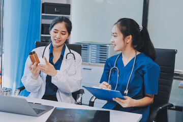 Medical, meeting and laptop for team in office in discussion, brainstorming and planning. Doctor, nurse and computer on desk, teamwork or workshop for Model Internal organ.