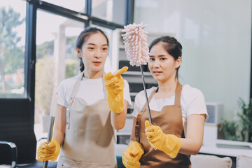 Cleaners clean empty office spaces