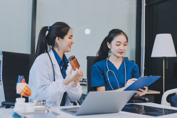 Medical, meeting and laptop for team in office in discussion, brainstorming and planning. Doctor, nurse and computer on desk, teamwork or workshop for Model Internal organ.