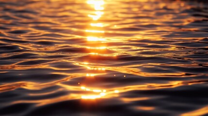 Golden sunbeams shimmering on rippling water surface, creating a mesmerizing and tranquil natural scene