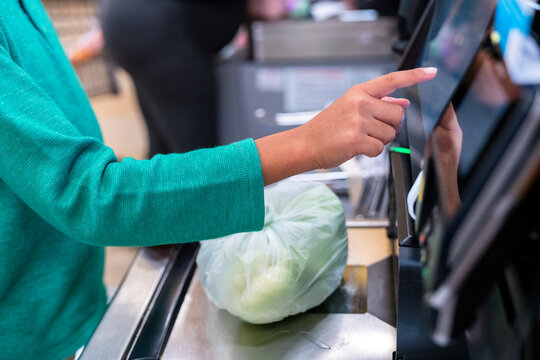 Self-checkout Process at a Grocery Store With Fresh Produce