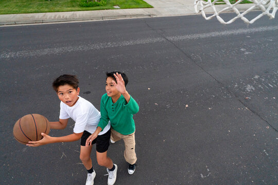 playing street basketball 