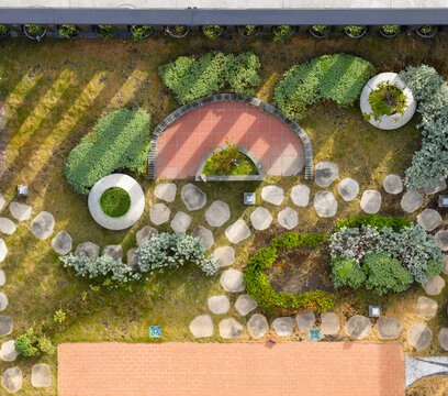 Aerial View Of Rooftop Garden With Greenery Stone Paths Red Bric