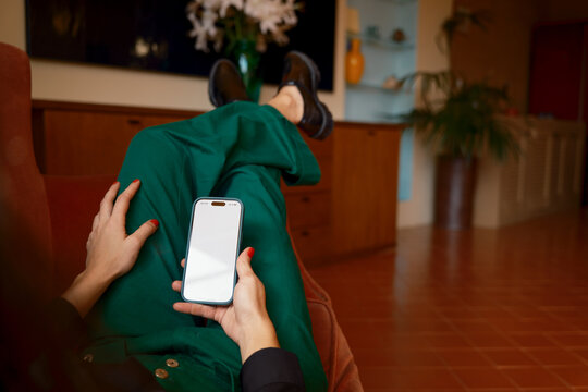 Anonymous woman browsing on smartphone