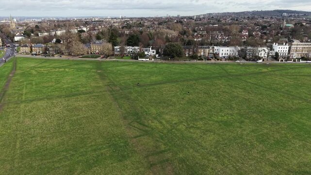 Large houses boardring Blackheath London UK drone push in shot 4K footage