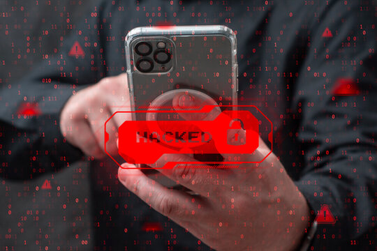Person holding a smartphone with a red hacked warning and digital lock overlay. Cybersecurity threat, data breach, mobile hacking, privacy risk and online security concept. - Powered by Adobe