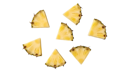 Fresh pineapple chunks against black background
