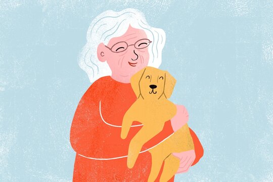 Happy elderly woman with her dog