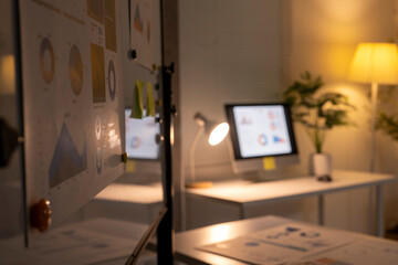 Business data analysis charts reflecting late night work