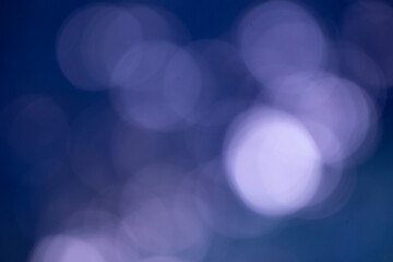 blue bokeh background from nature under tree shade for party