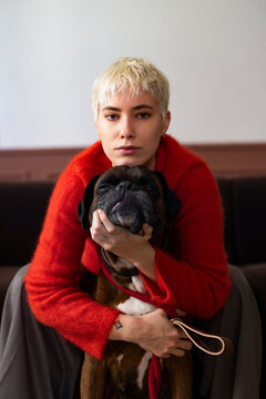 Woman In Red Sweater With Dog, Portrait At Home