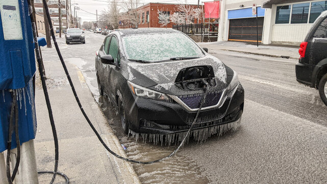 Electric Car Covered in Ice After Winter Storm