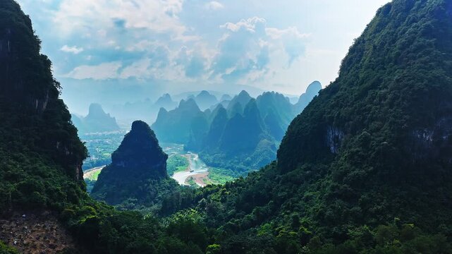 Aerial shot of majestic karst mountain with winding river natural landscape in Guilin, China. 
