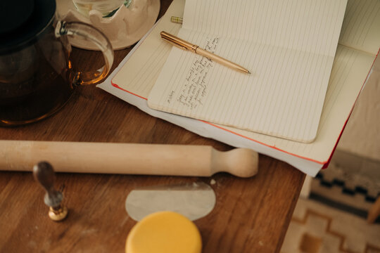 Ceramic Artist&acirc;s Workspace with Handwritten Notes
