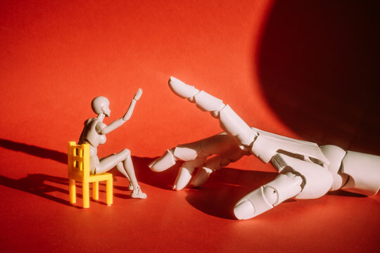 Artistic scene of a small figure and a giant hand
