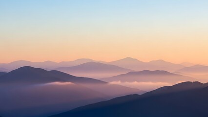 Naklejka premium Serene mountain landscape at dusk with layered hills and fog