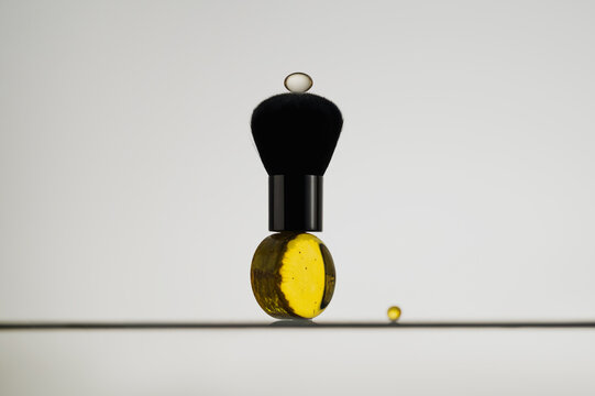 Minimal still life with makeup brush and wellness supplements