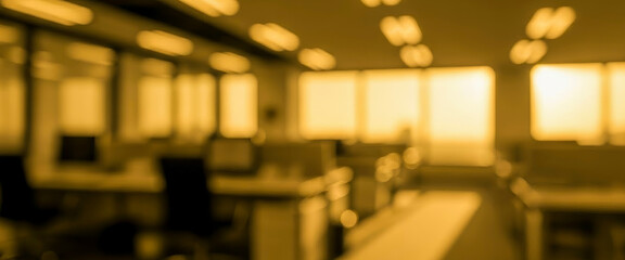 Office environment features blurred outlines of desks and chairs, with soft golden lighting creating a warm, inviting atmosphere ideal for productivity and collaboration.