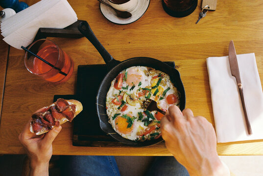 Top view of man's breakfast at hotel's cafe.