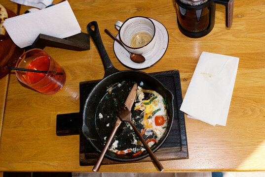 Top view of leftovers of breakfast at hotel's cafe.
