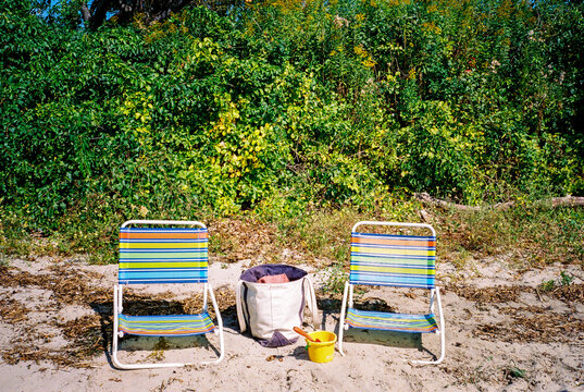 Beach chairs, bag and toys on 35mm film