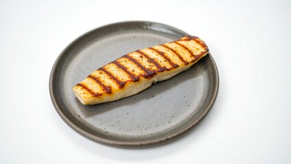 Grilled halloumi cheese on a plate