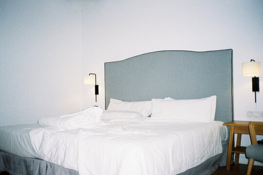 Hotel Room with Made Bed
