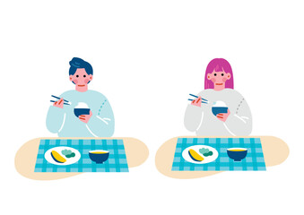 食事をする若い男女