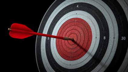 Red dart hitting bullseye represents marketing success