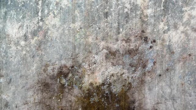 Close up of old weathered concrete wall texture with cracks and stains