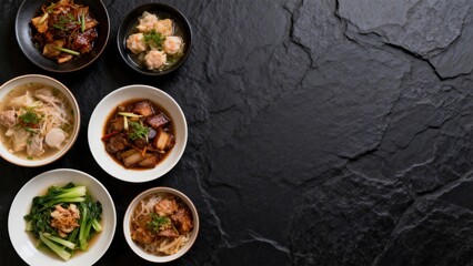 Assorted dishes on dark stone surface